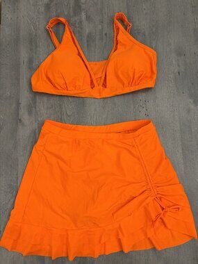 Women's bikini set. Orange. V cut top and ruched skirt. NEW Size L